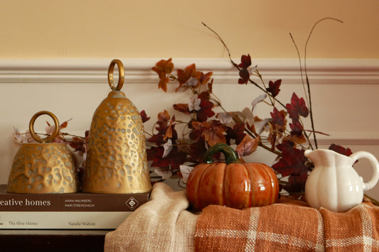 "Cosy autumn home styled with candles, throws and rustic décor"