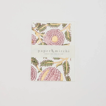 A pack of Paper & Mirchi Sunday Party Cards featuring a botanical pattern with pink flowers and green leaves on a white background.