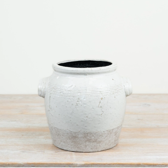 Two tone ceramic pot with a textured finish and contrasting glazed detail