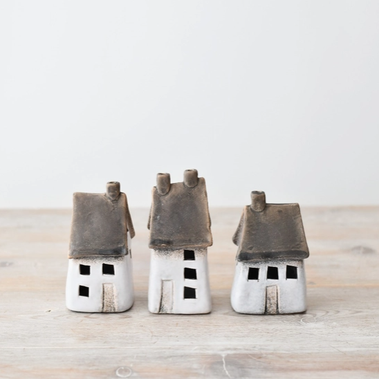 Set of three speckled LED light-up houses with contrasting roofs and cut-out windows
