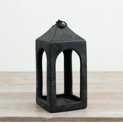 Charcoal ceramic lantern with a pyramid roof, arched openings and a metal ring handle, viewed from a slight angle
